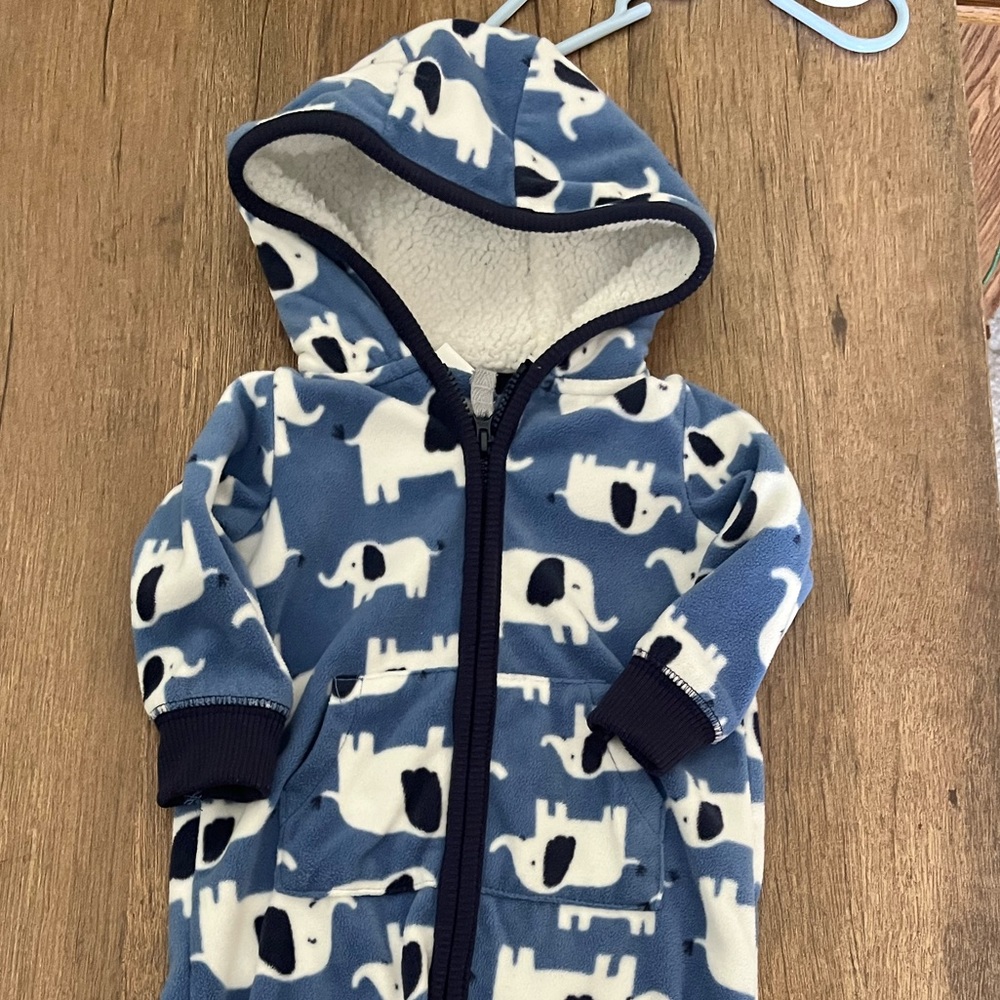 Keep your little one warm with this footless fleece zip up!!